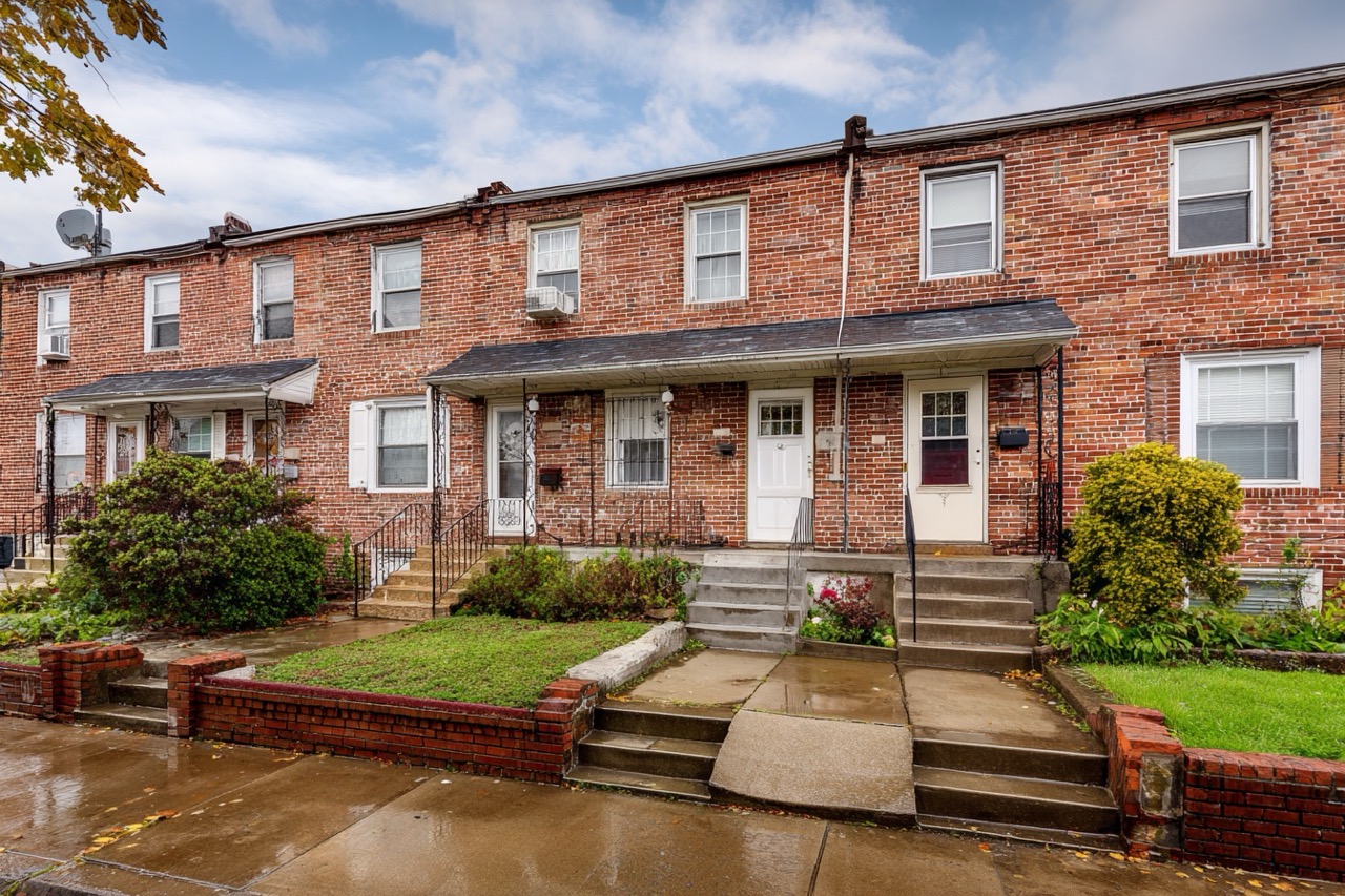 Rental property for sale in Maryland showing typical Baltimore rowhouse architecture